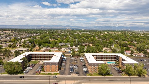 an aerial view of an office building and a parking lot