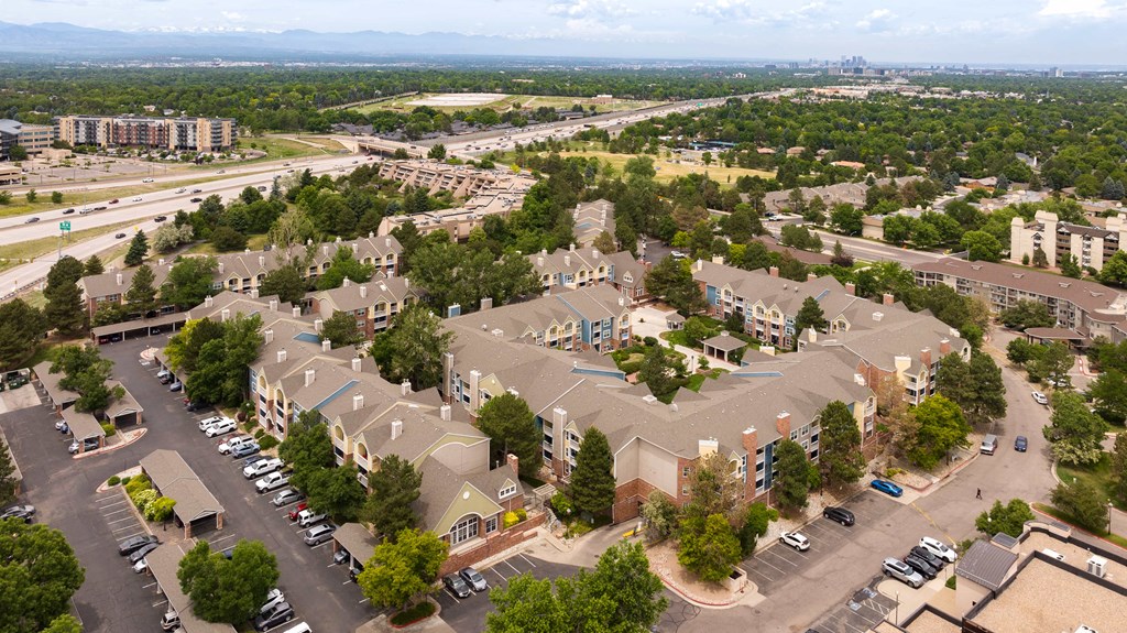 an aerial view of an empty parking lot in a city