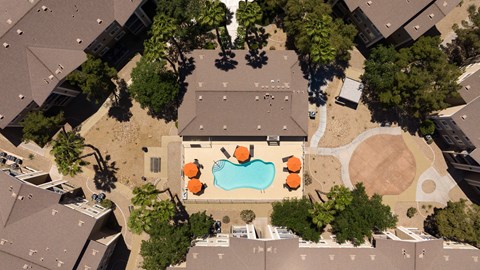 a house with a pool in the middle of its roof