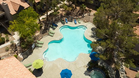 an overhead view of a swimming pool at the resort