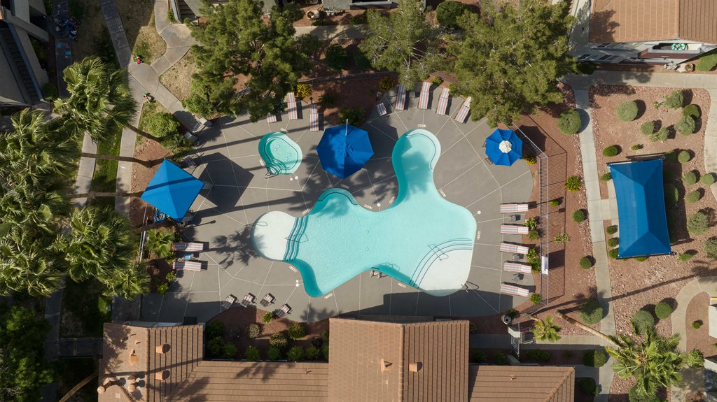 a birds eye view of a swimming pool in a park