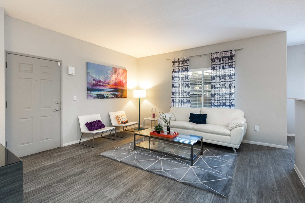a living room with a couch and a coffee table