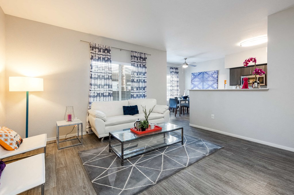 a living room with a couch and a table