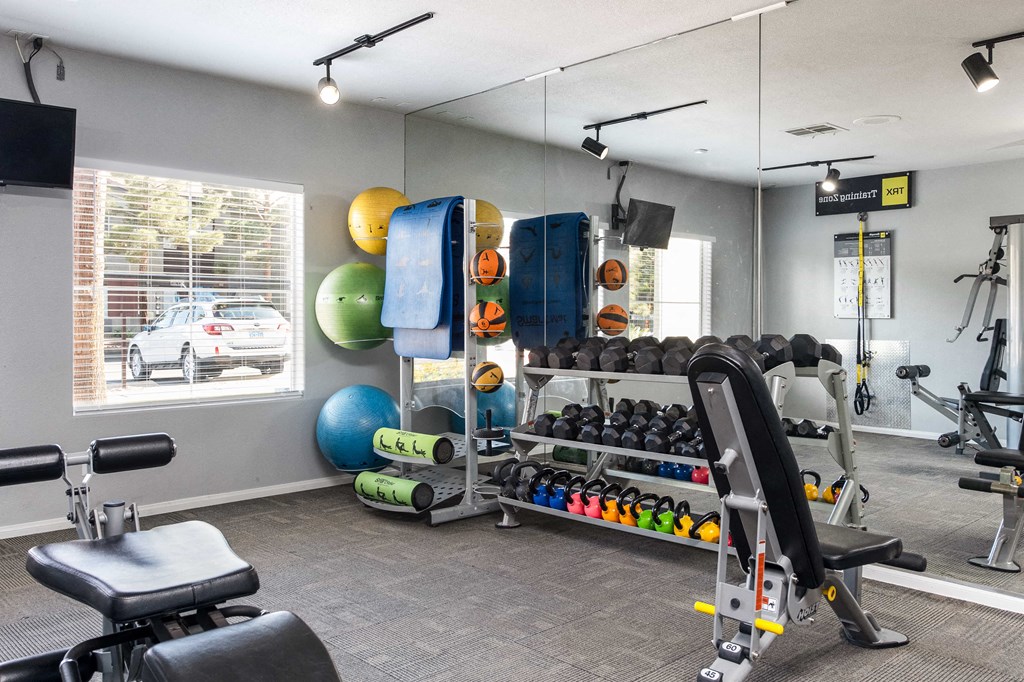 the preserve at ballantyne commons fitness room with weights and other gym equipment
