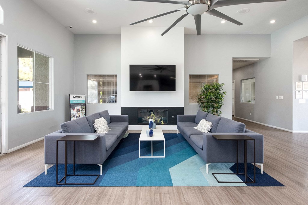 a living room with couches and a coffee table