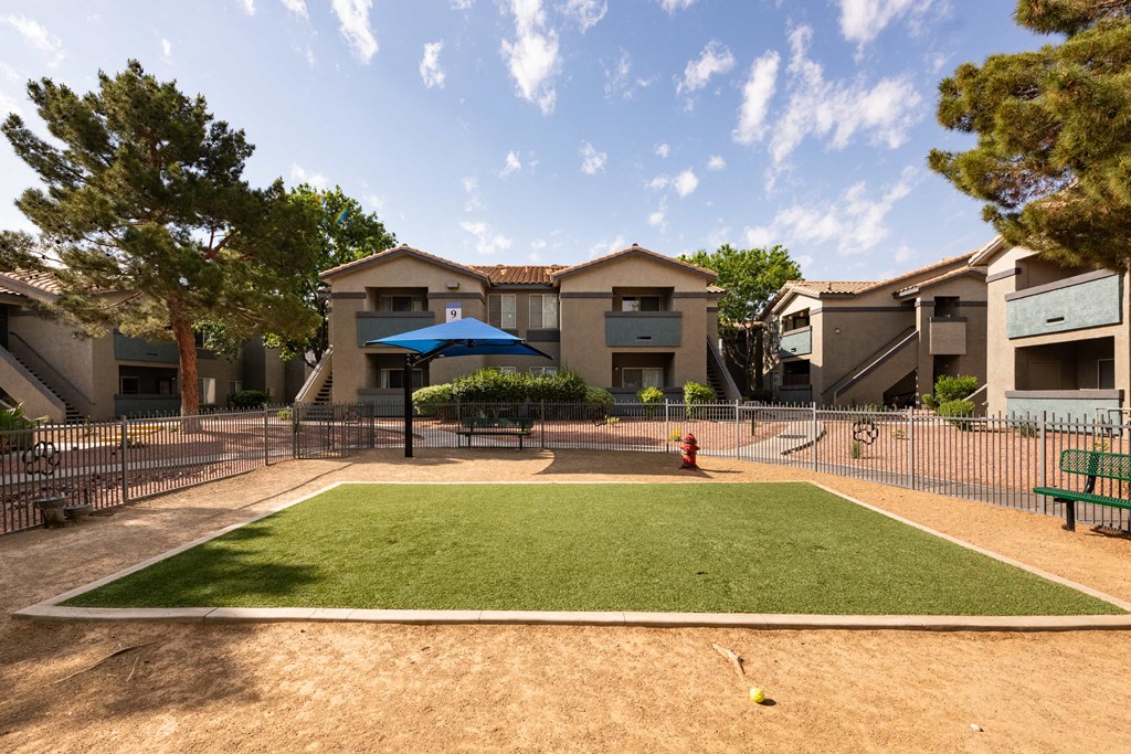 our apartments have a fenced in yard with a playground and a pool