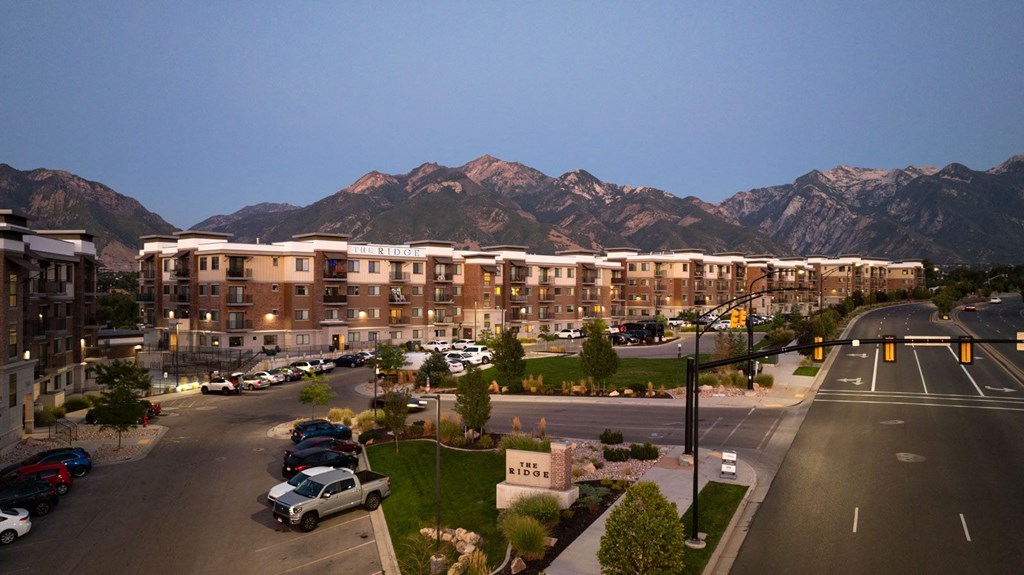 a view of a city with mountains in the background