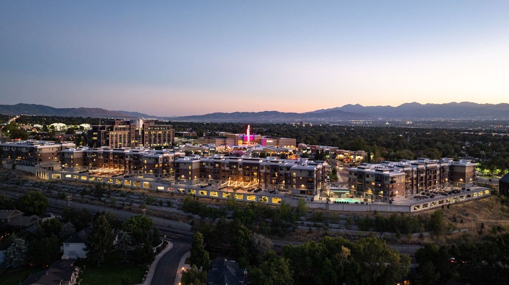 an aerial view of the city at dusk