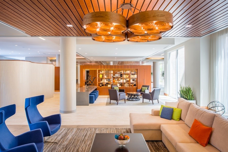 a lobby of a hotel with couches and chairs at The Metropolitan Downtown Columbia, Columbia, MD