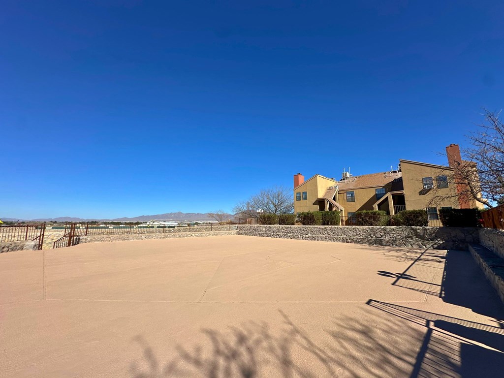 A house with a driveway in front of it.