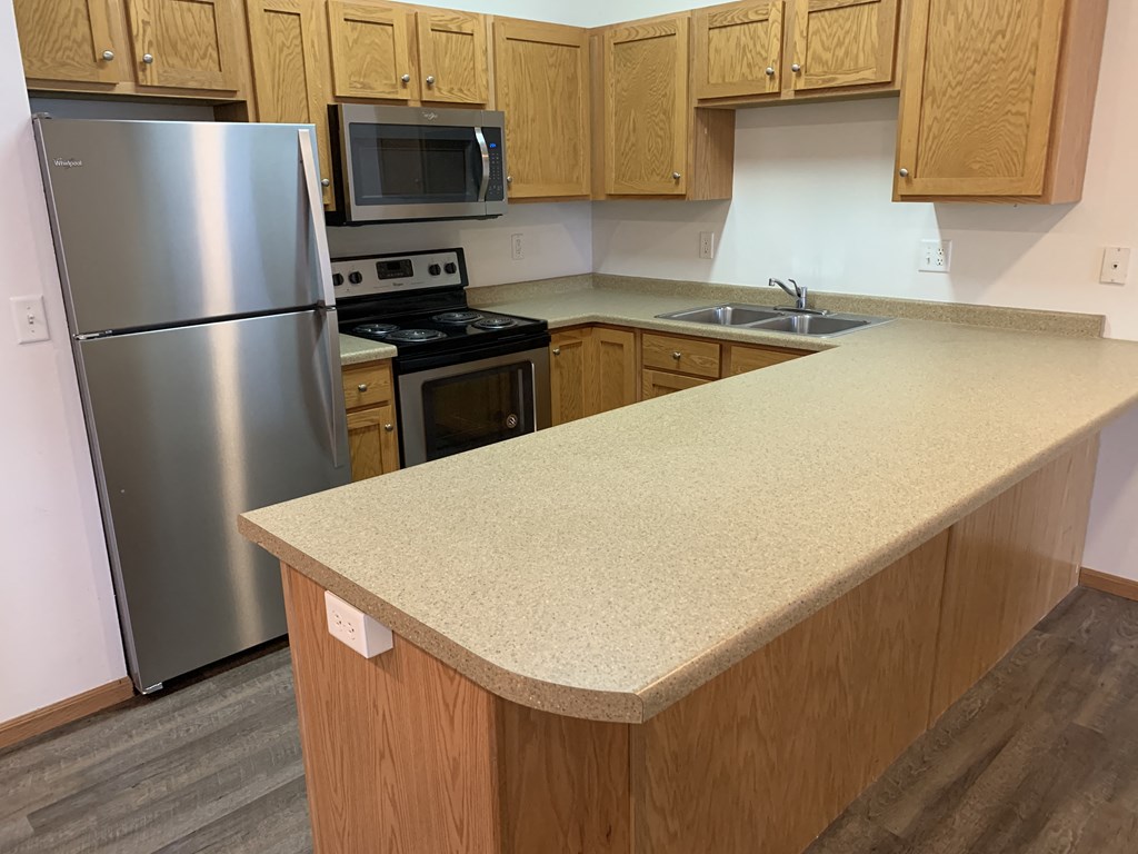 Countertop Kitchen at Warehouse Apartments, North Dakota, 58102