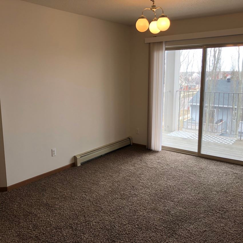 Unfurnished Living Room Unfurnished Living Room at Sandstone Apartments, Fargo, 58103 - Photo Gallery