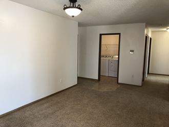 Carpeted Living Space at Royal Oaks Apartments, North Dakota, 58103