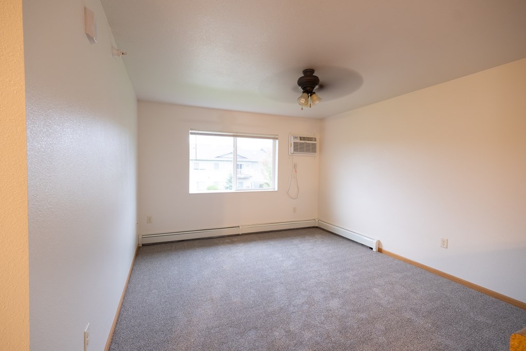 Carpeted Bedroom at Timber Ridge Apartments, Minnesota, 56601