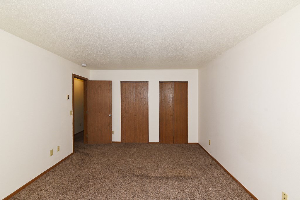 Empty bedroom at Jacobs Square Apartments, St. Cloud, 56303