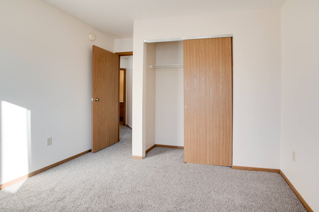 Bedroom with Closet at Dock 9 Apartments, Fargo, 58103