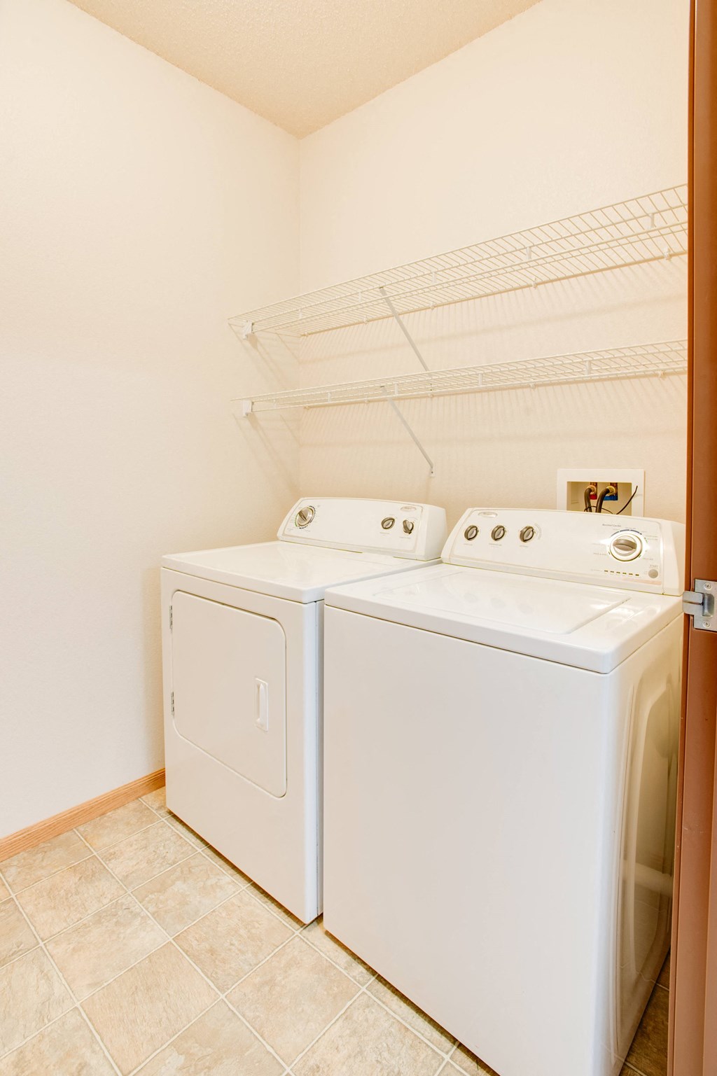 a washer and dryer in the laundry room of a home