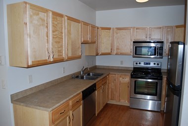 Closed Kitchen at Urban Crossing Apartments, Fargo, 58102 - Photo Gallery 4
