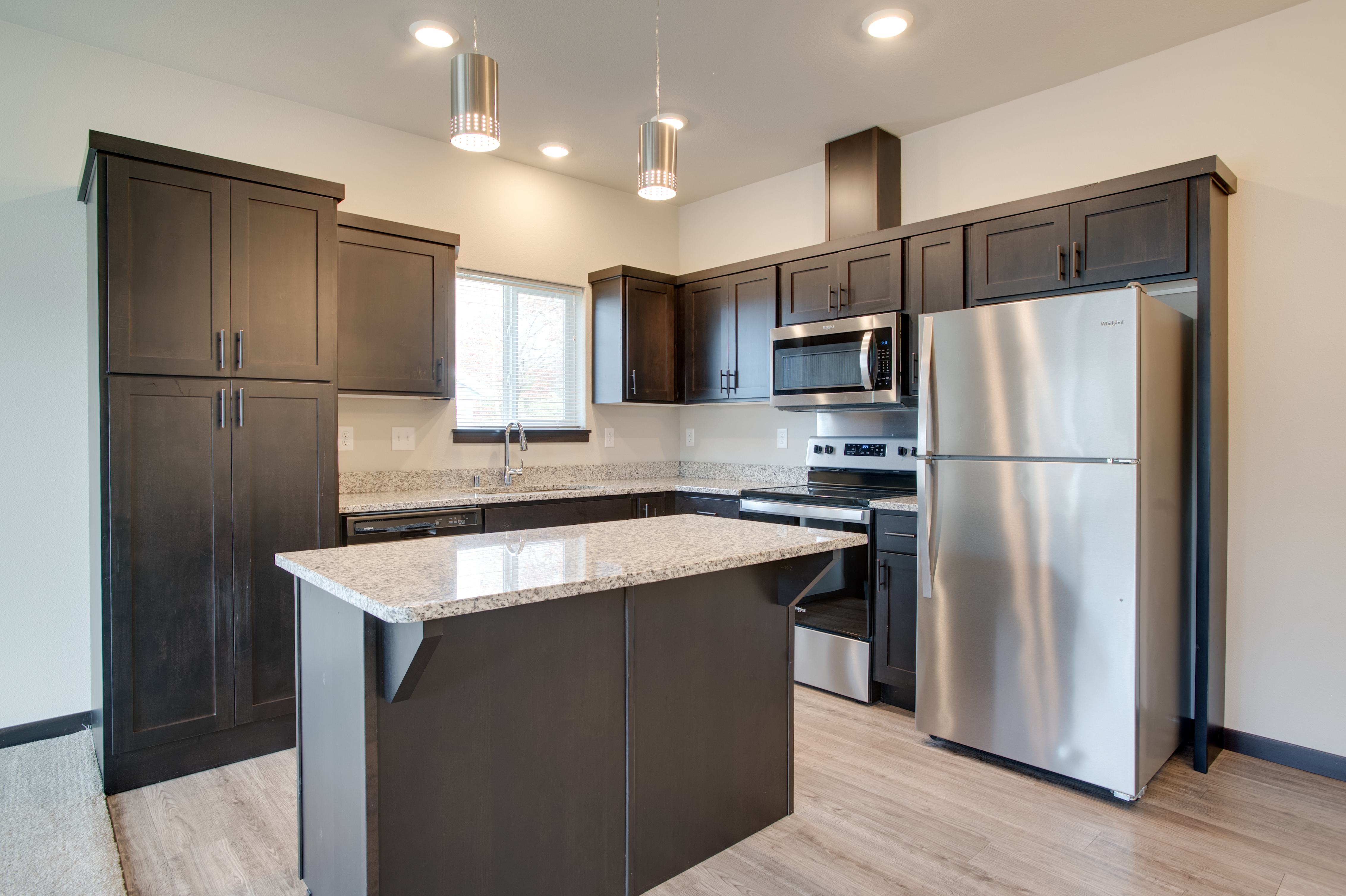 Kitchen with stainless steel appliances and granite counter tops
