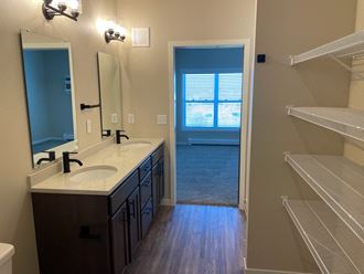 Bathroom With Closet at Augusta Apartments, Fargo, ND, 58104