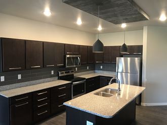 Fully Equipped Kitchen at Mezzo Apartments, Fargo, ND