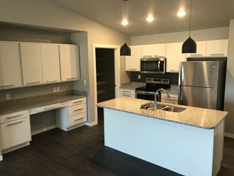 Fully Equipped Kitchen With Modern Appliances at Mezzo Apartments, North Dakota, 58104