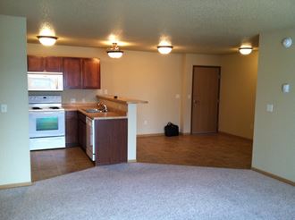 Living Room with Kitchen at Waterstone Apartments, Moorhead, MN