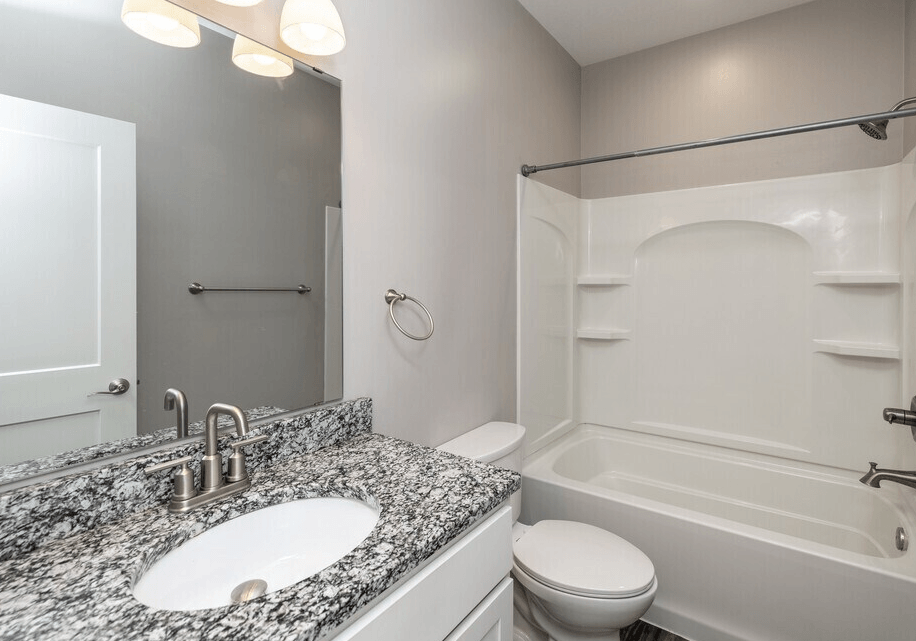 Bathroom With Bathtub at Warehouse Apartments, North Dakota