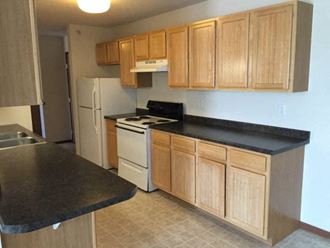 Fully Furnished Kitchen at Pelican Heights Apartments - Detroit Lakes, Detroit Lakes, Minnesota