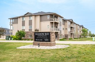 an image of the shadow bay apartments sign