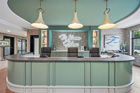 A reception area with a sign that says "Welcome Home".