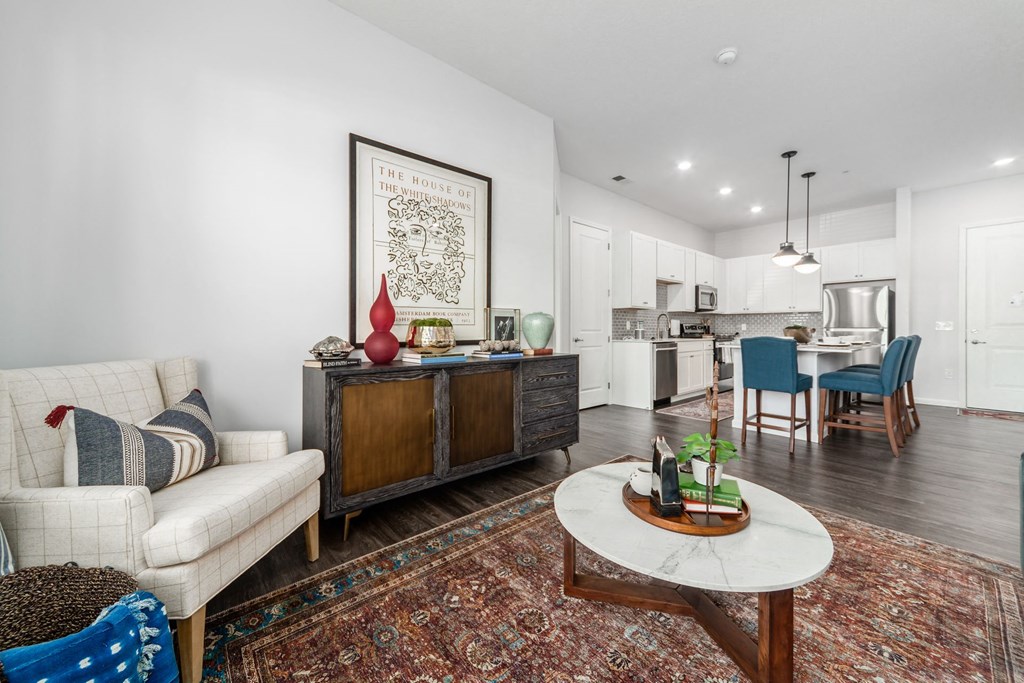 a living room with a couch and a table