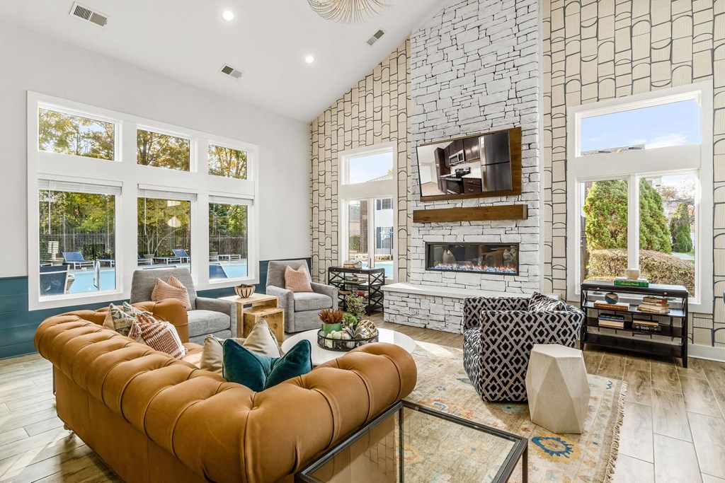 a living room with a couch and a fireplace