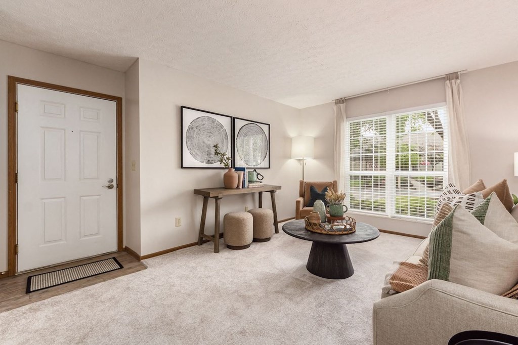 a living room with a couch and a table