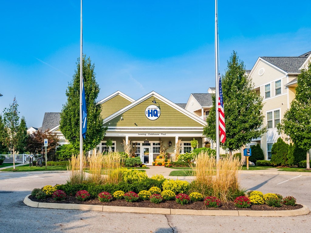 the front of the hbc building flags in front of it