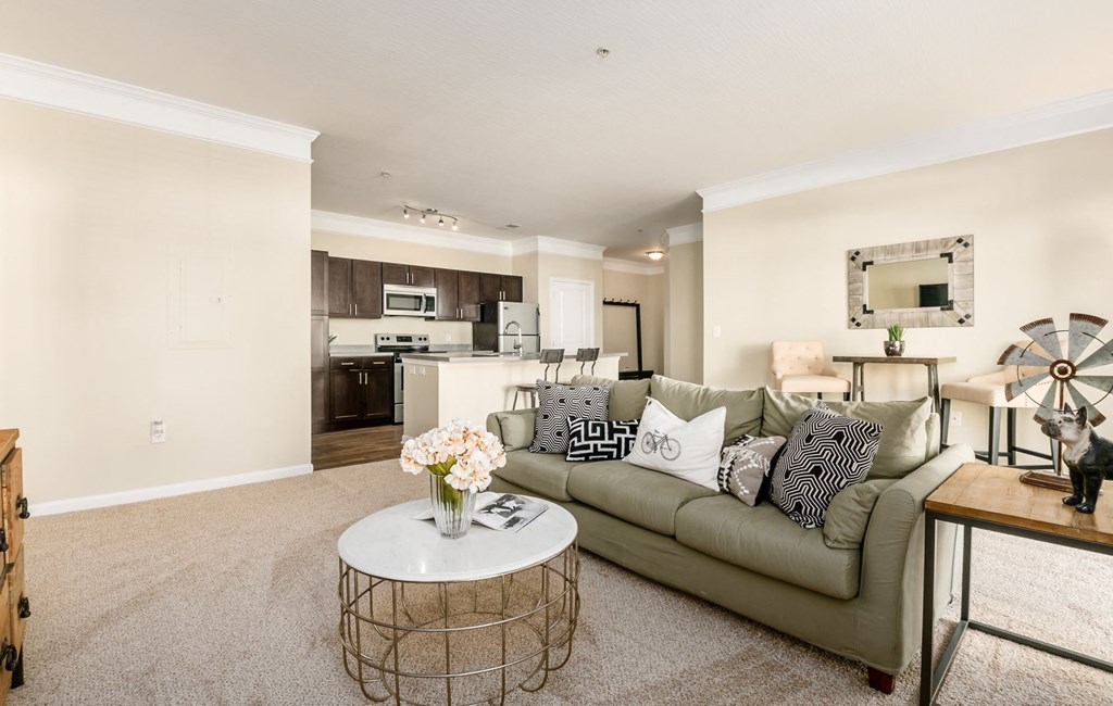 a living room with a couch and a table