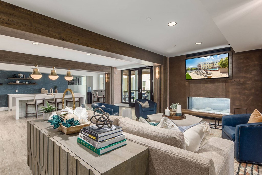 a living room with a couch and a table