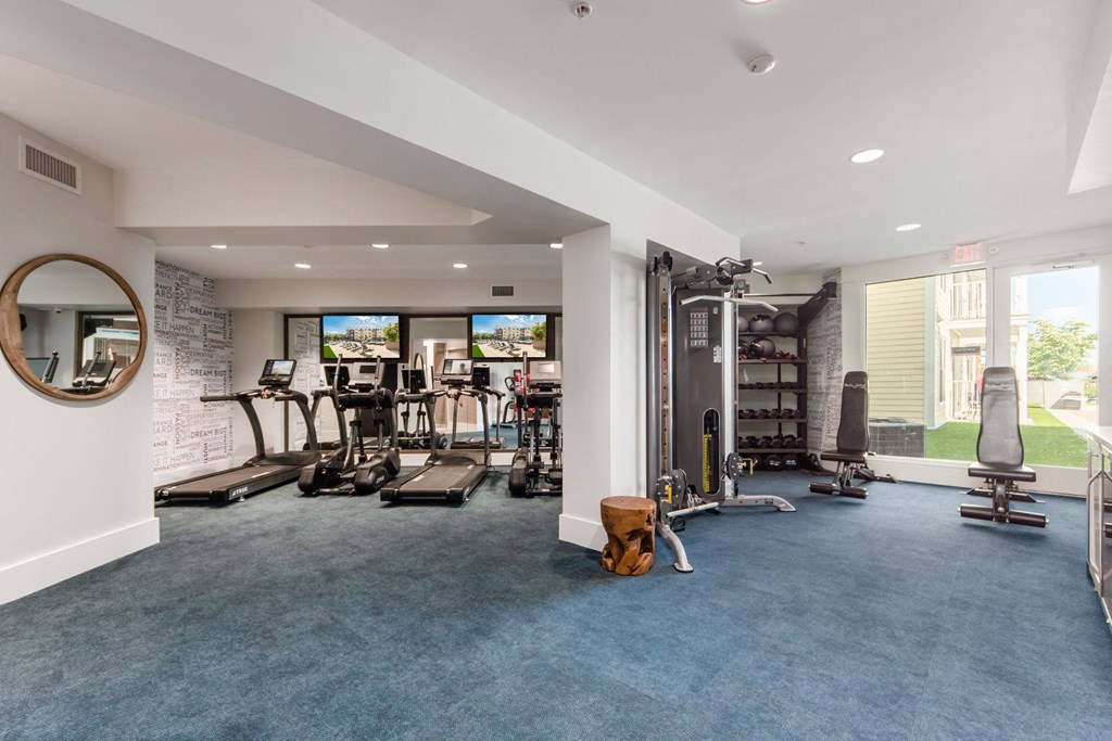 the gym at the flats at big tex apartments