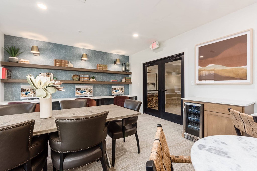a dining room with a table and chairs and a fireplace