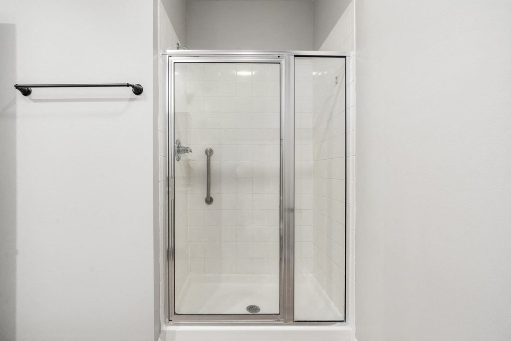Residences of Gahanna newly renovated main bathroom looking toward stand up shower with glass door