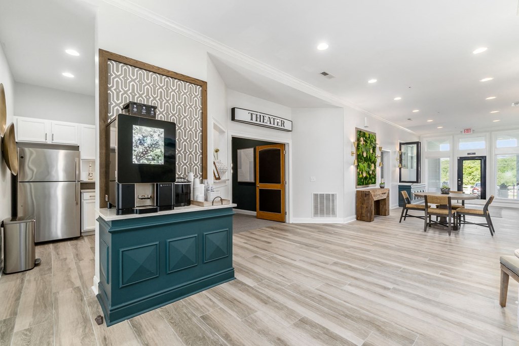 a living room with a blue counter and a tv