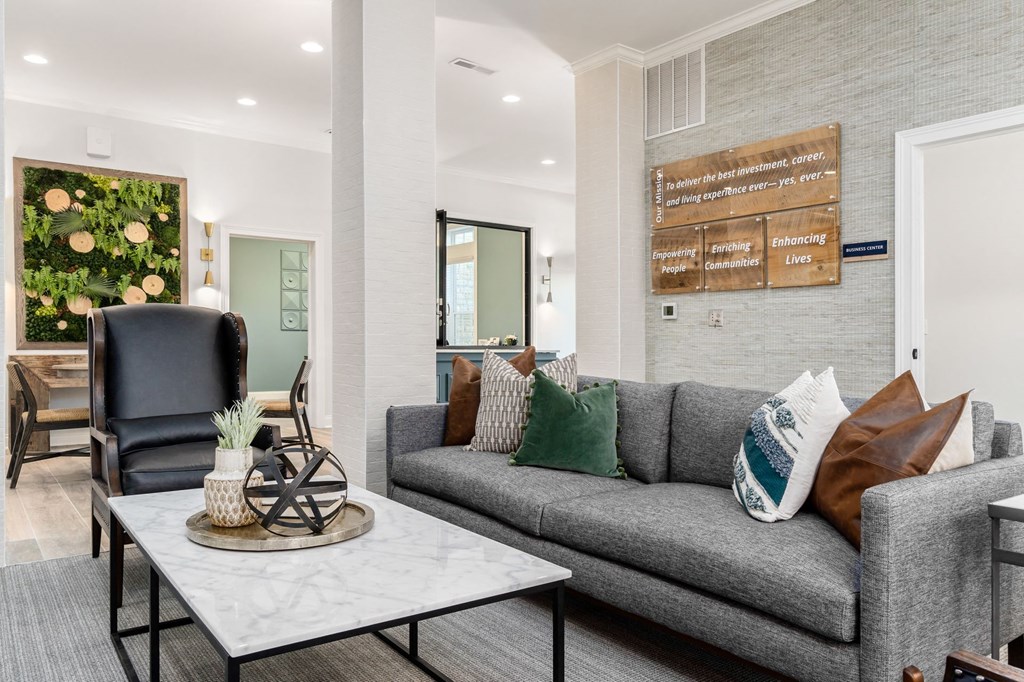 a living room with a couch and a table