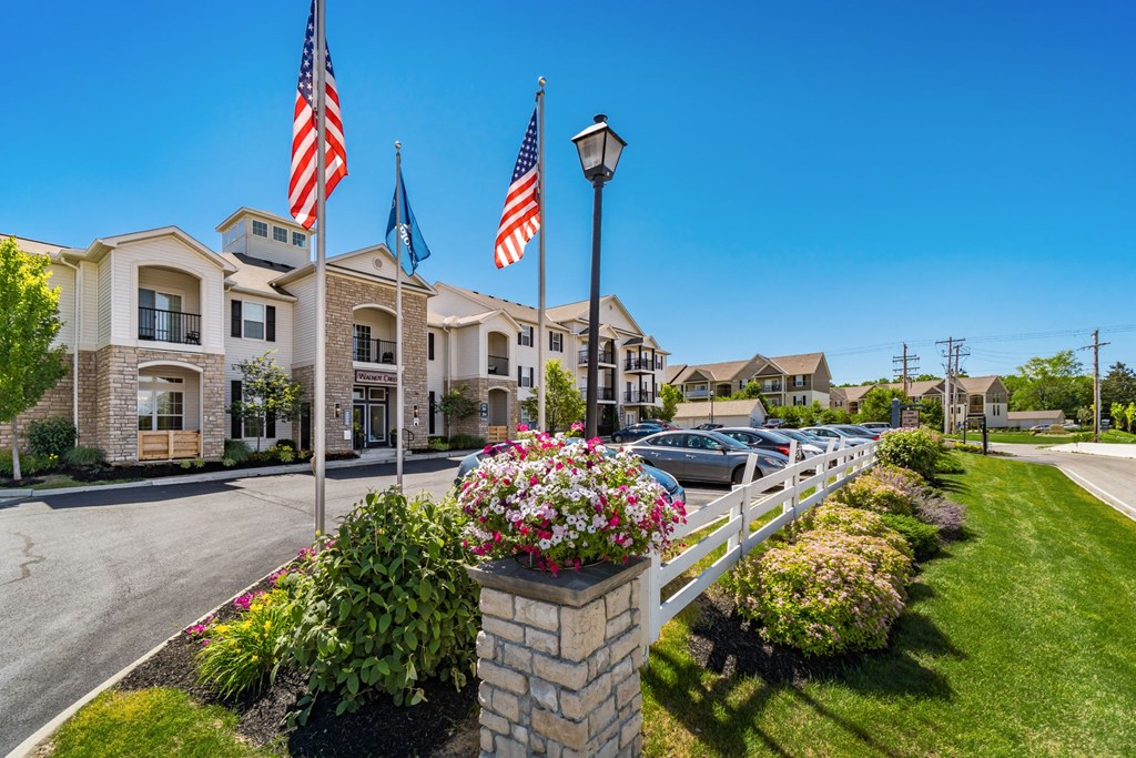street flags in front of houses on a sunny day