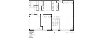 A black and white image of a house floor plan.