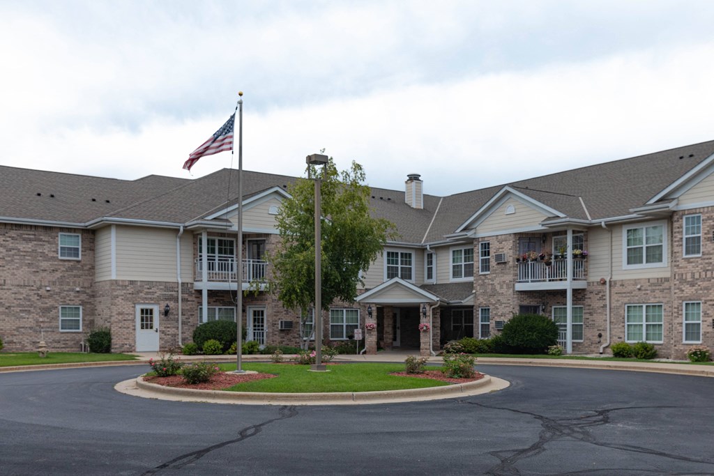 a large building with an flag in front of it