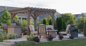 Outdoor Gathering Area with Fire-pit and Grill