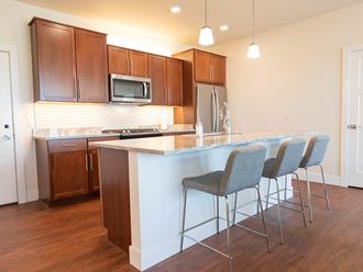Eat-In Kitchen Design Eat-In Kitchen Design at Cedar Place Apartments, Cedarburg, WI, 53012 - Photo Gallery