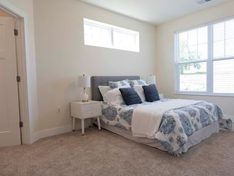 Master Bedroom With Large Windows at Cedar Place Apartments, Cedarburg, WI
