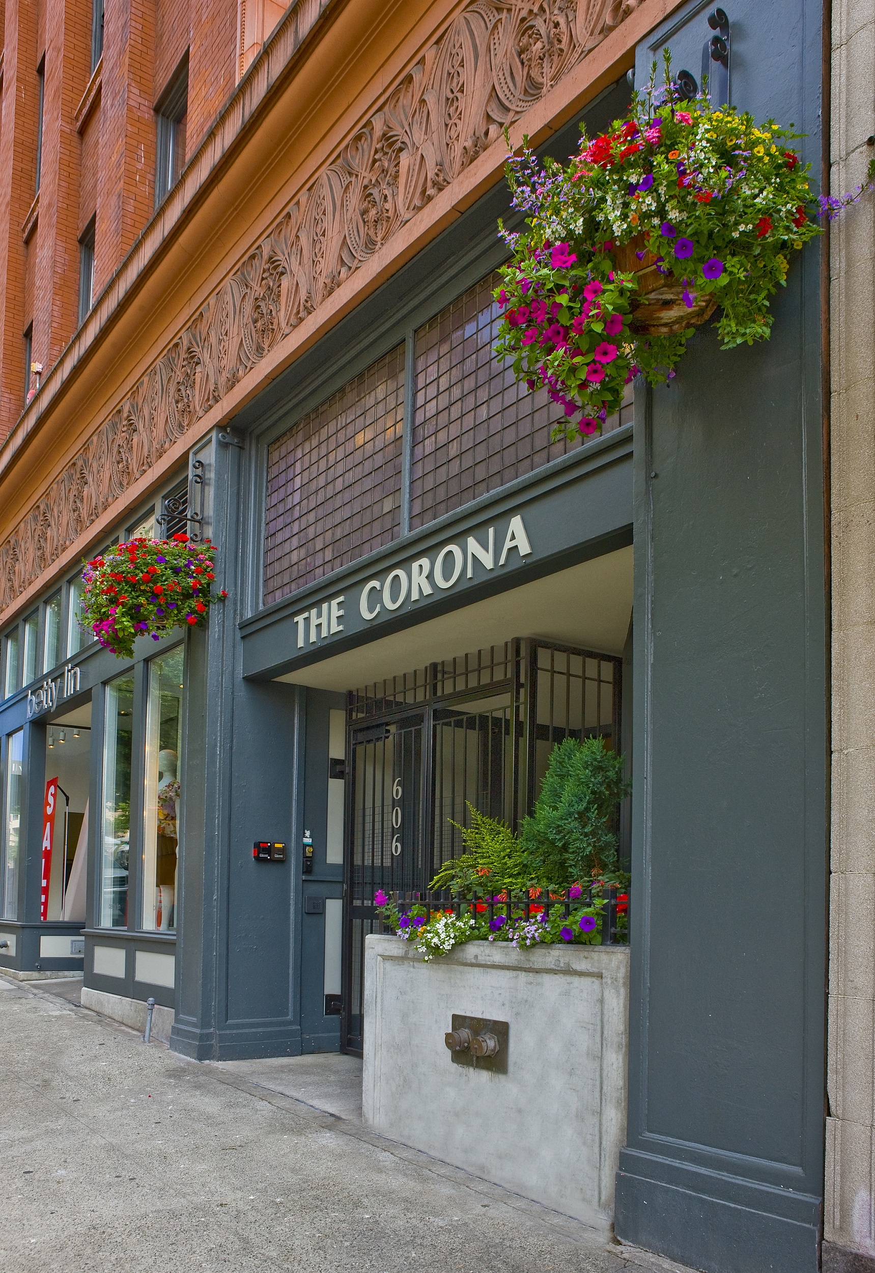 a building with a sign that reads the corona on it