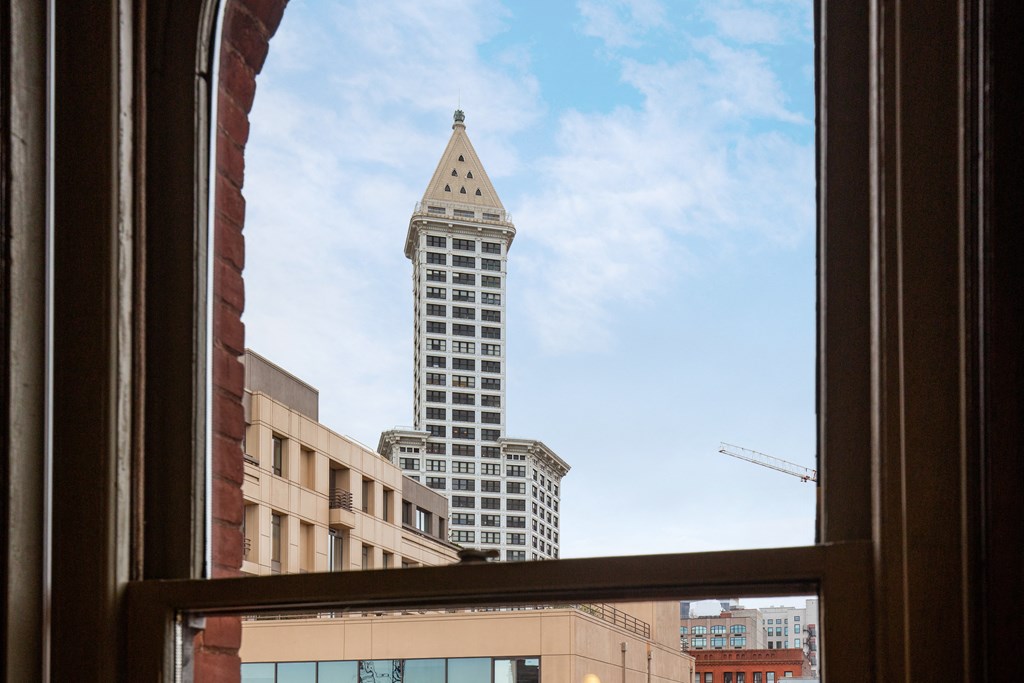 a view of a tall building from a window